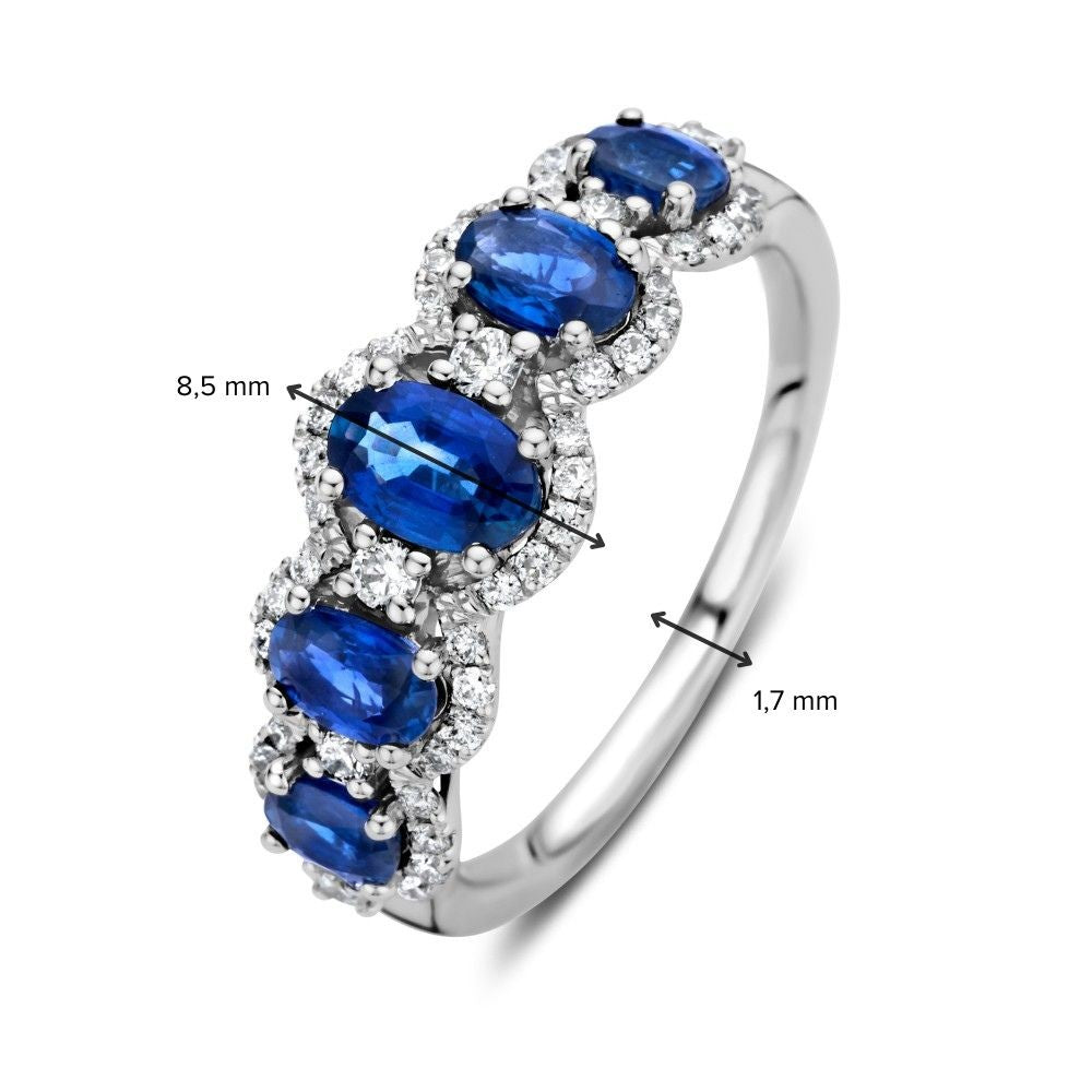 Anillo de lujo de oro blanco de 14 quilates con zafiro azul tallado en óvalo y 0,32 quilates de diamantes