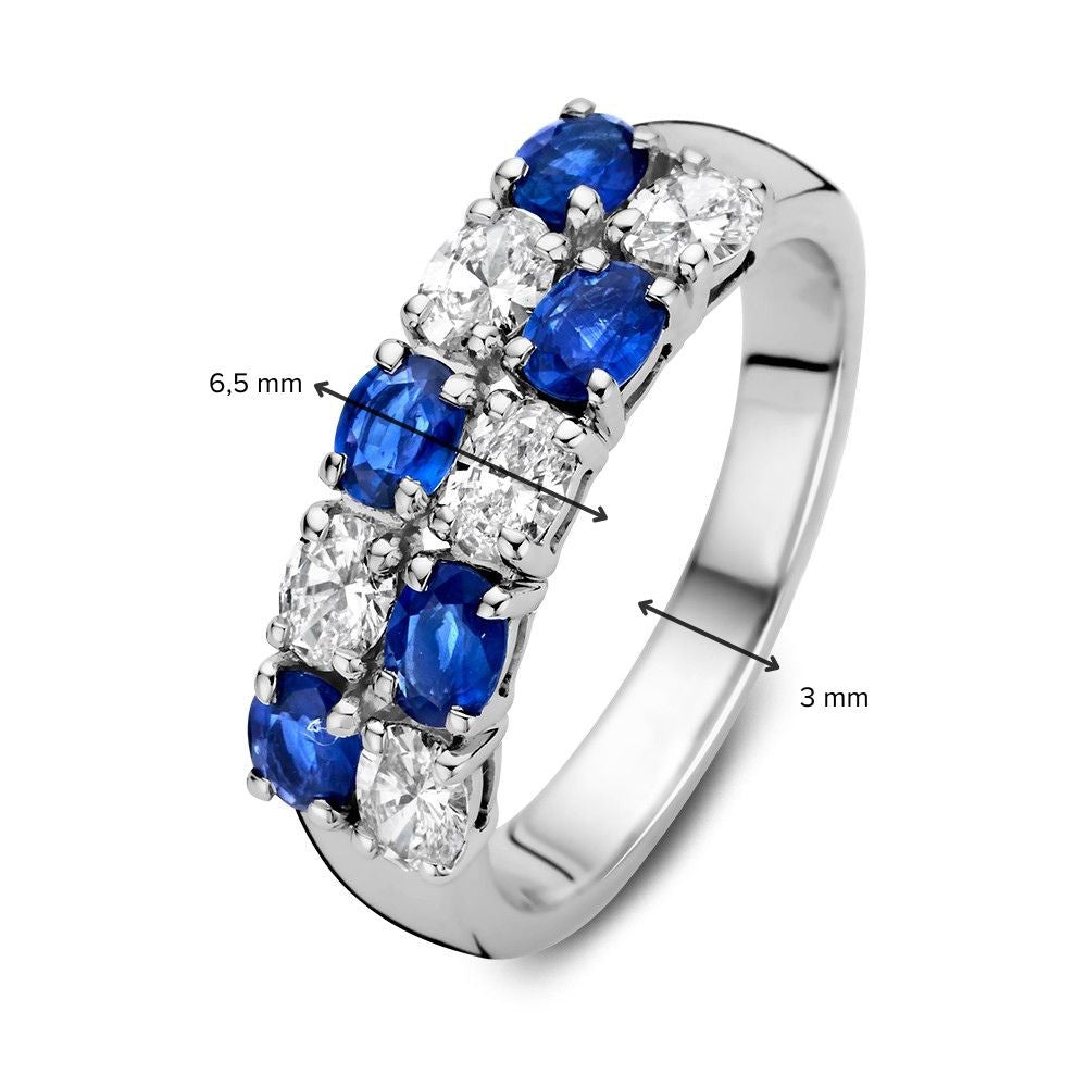 Anillo de oro blanco de 14 quilates con zafiro azul tallado en óvalo y diamantes de 0,70 quilates