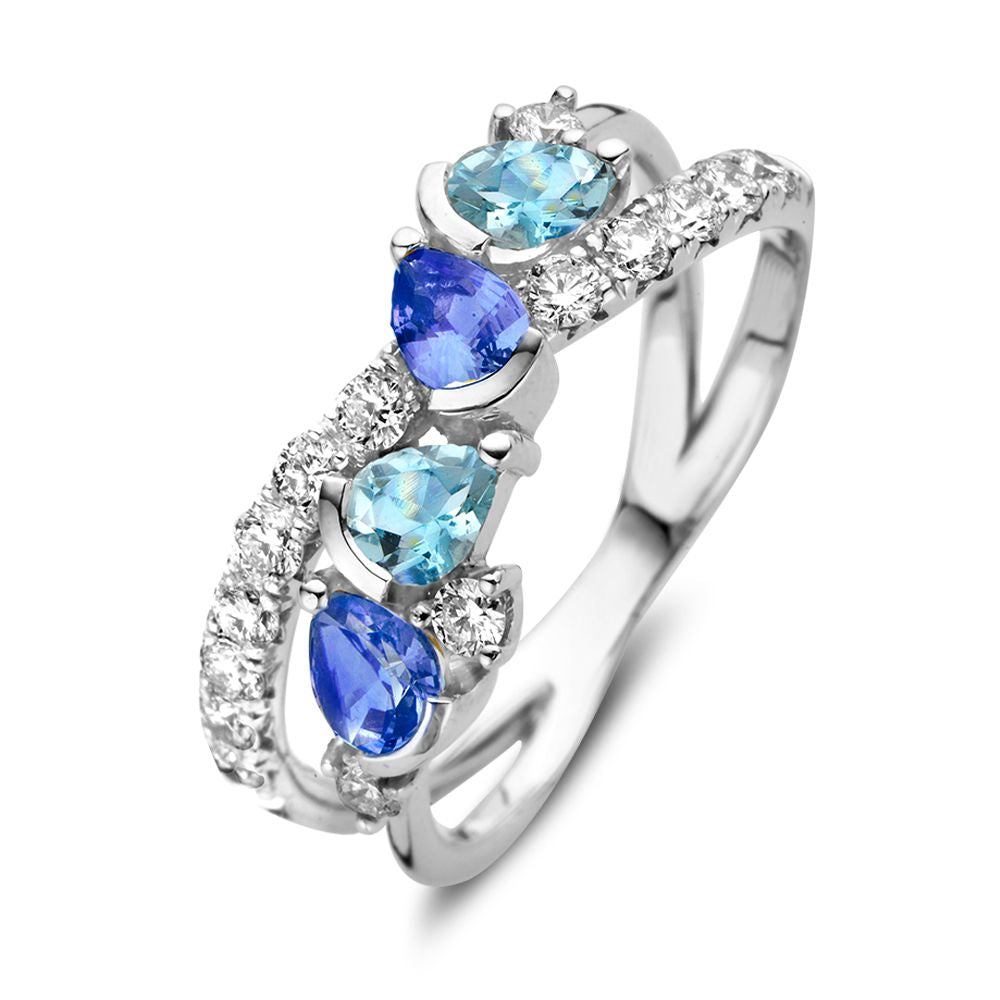 Anillo de oro blanco de 18 quilates con zafiros azules en forma de pera, aguamarinas y diamantes de 0.50 ct.
