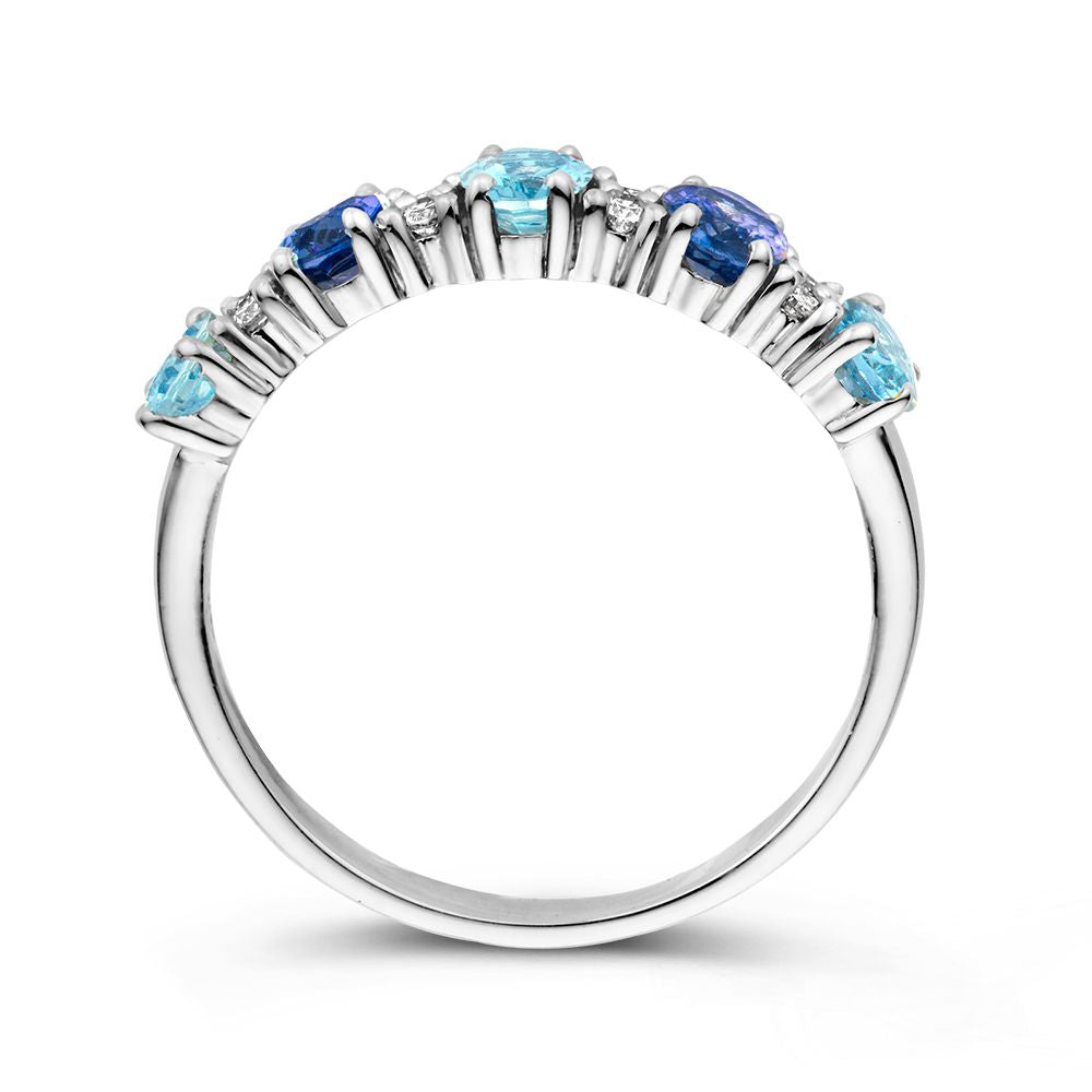 Anillo de oro blanco de 18kt con zafiros ovalados, aguamarinas y 0.12ct de diamantes