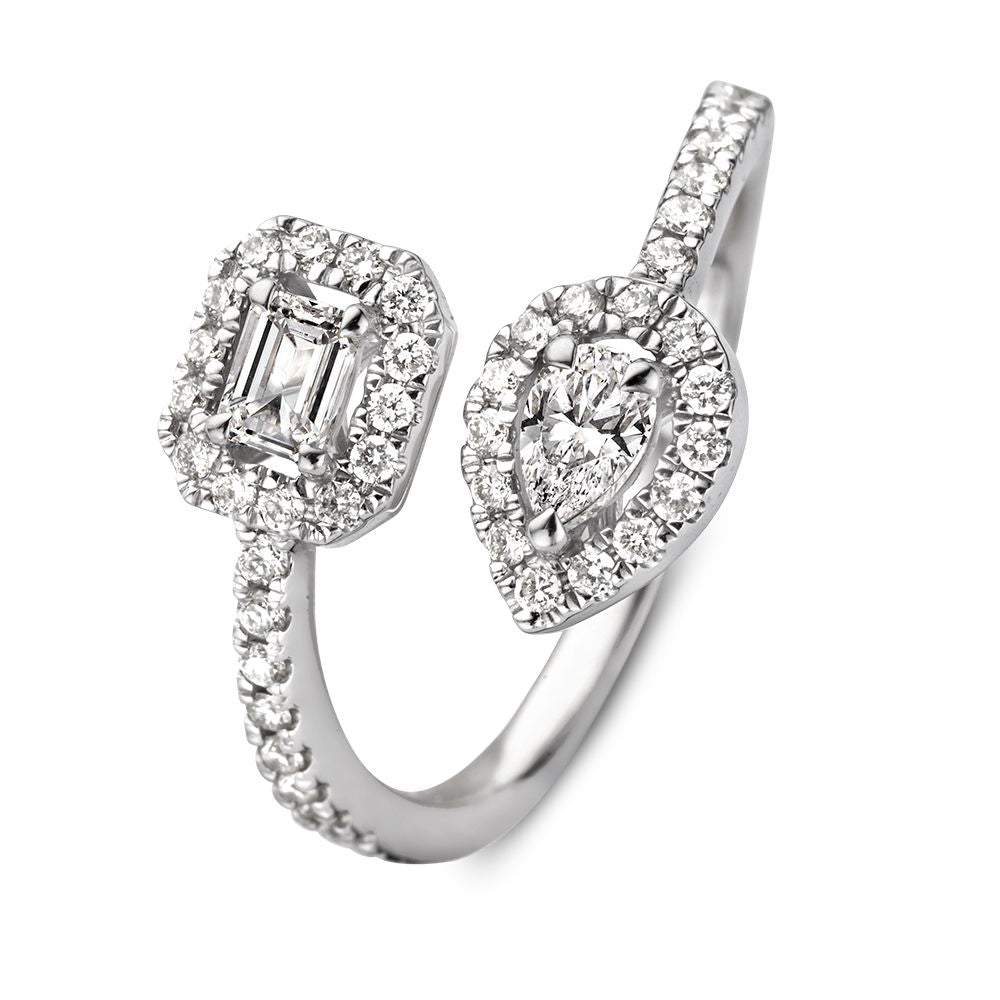 Anillo de oro blanco con diamantes, 0,68 quilates, con diamantes en corte esmeralda y en forma de pera.