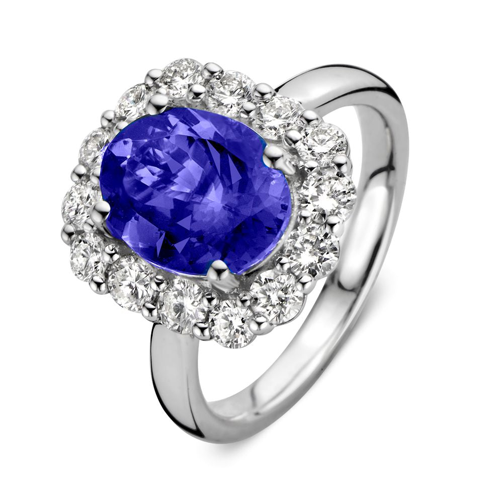 Anillo de oro blanco elegante con tanzanita y diamantes, con una tanzanita de 2.80 quilates en el centro.