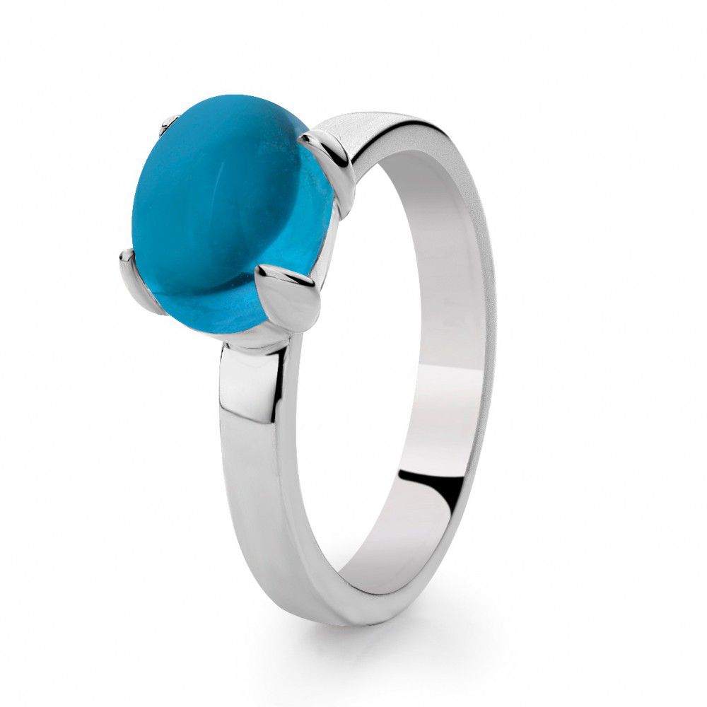 Anillo de topacio azul con un diseño sencillo y brillante, montura plateada.