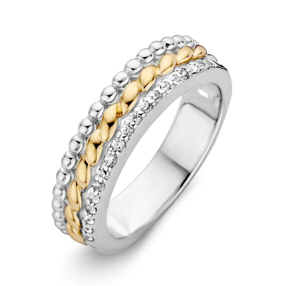 Anillo de dama de plata rodiada con detalles en oro de 14 quilates y circonitas, ancho de 6,1 mm.