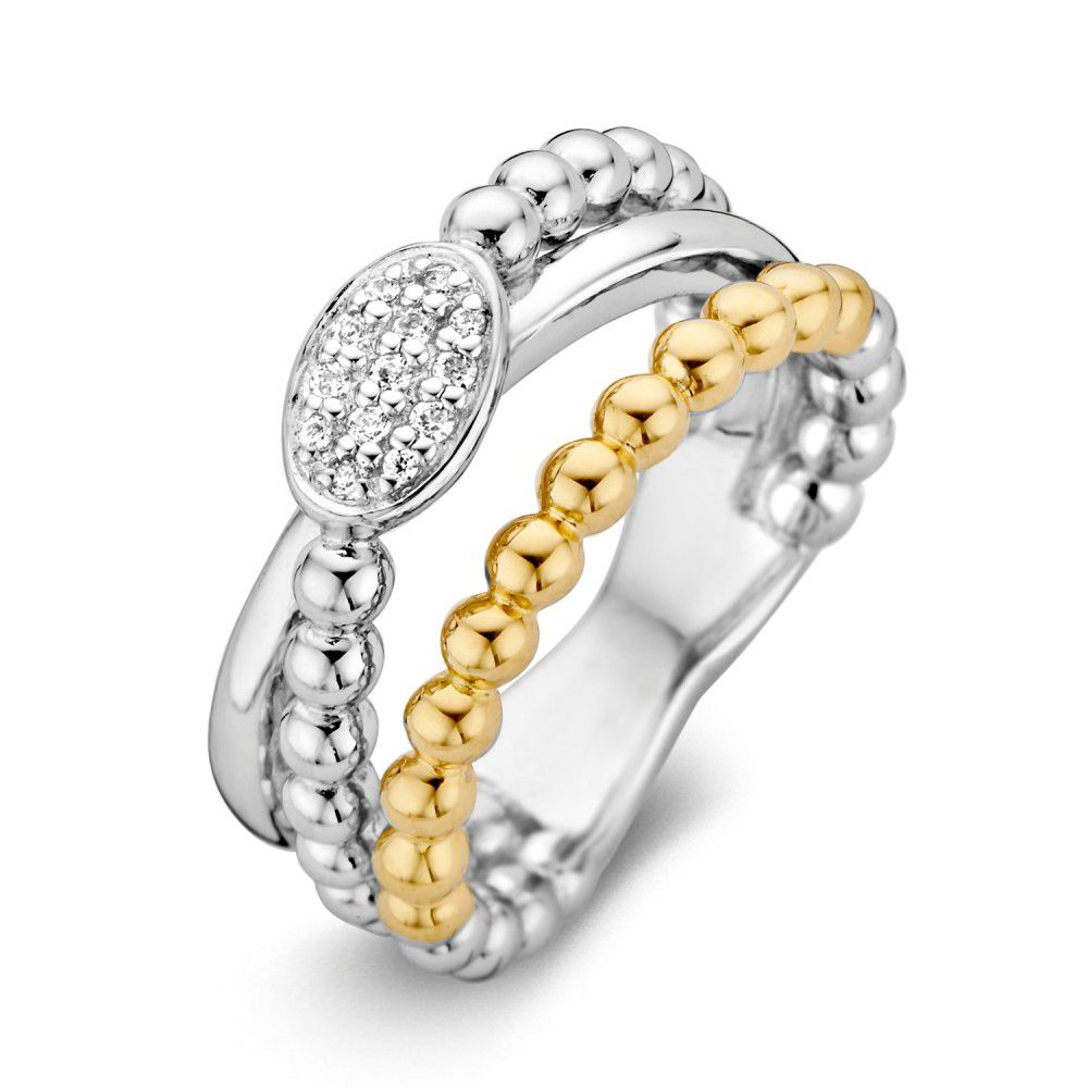 Anillo de dama de plata rodiada con detalles en oro de 14 quilates y circonitas.