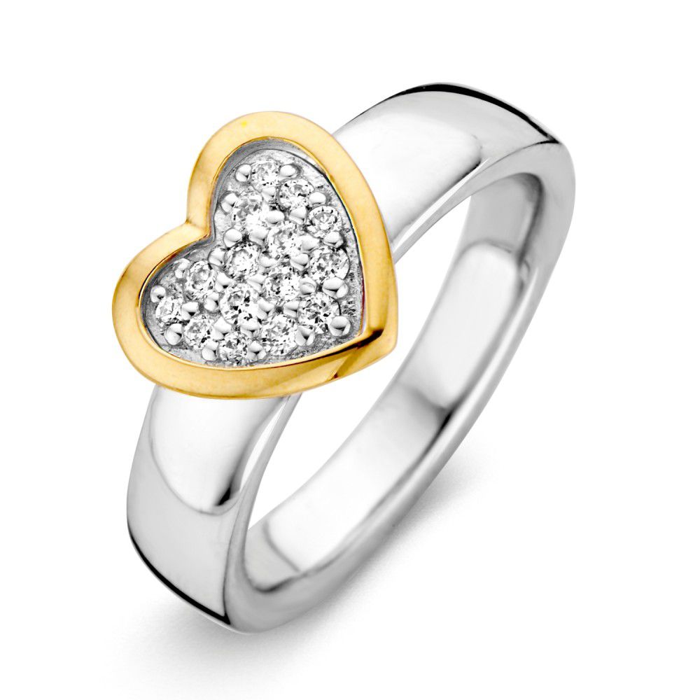 Anillo de mujer plateado con acentos en oro amarillo de 14 quilates y circonitas blancas en forma de corazón.