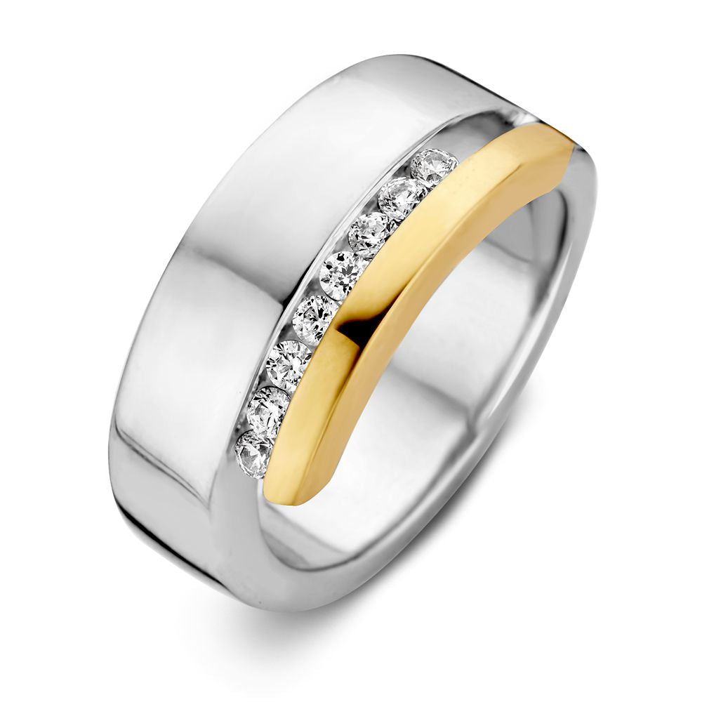Anillo de plata con detalle en oro y circonitas brillantes en el centro.