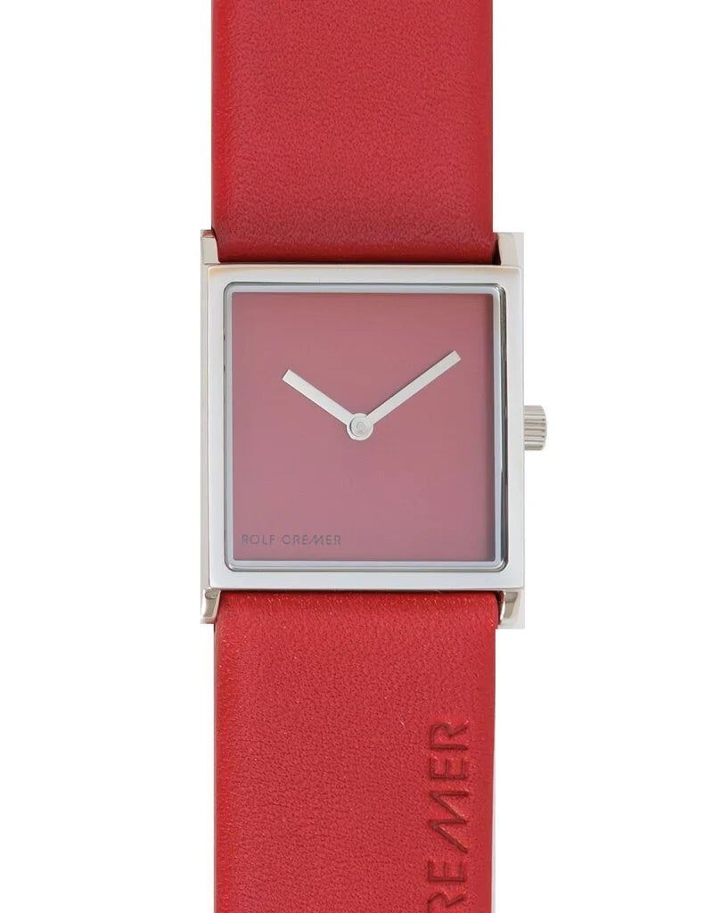 Reloj cuadrado con esfera roja y correa de cuero roja.