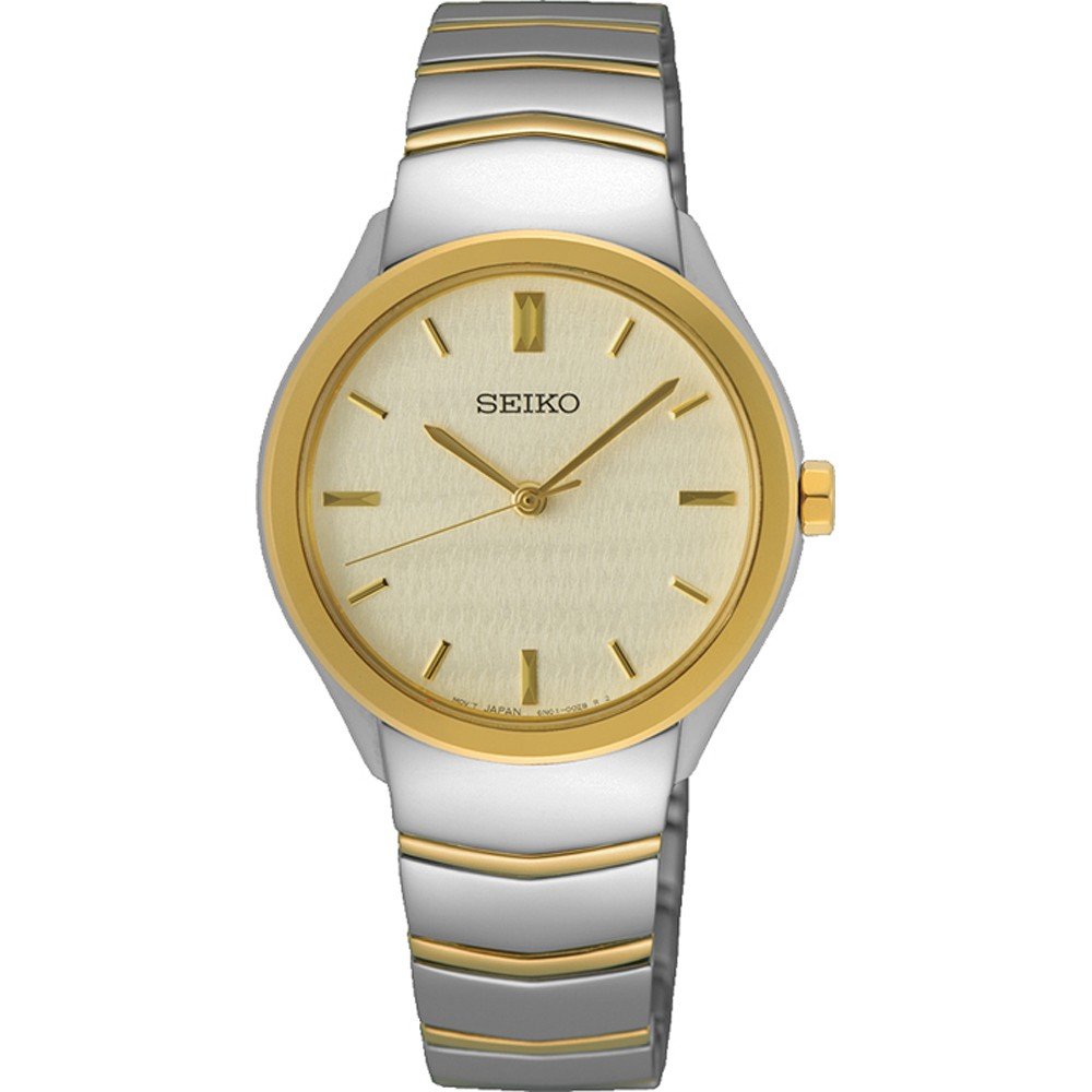 Reloj de dama Seiko con caja plateada y dorada, esfera dorada y correa de acero inoxidable.