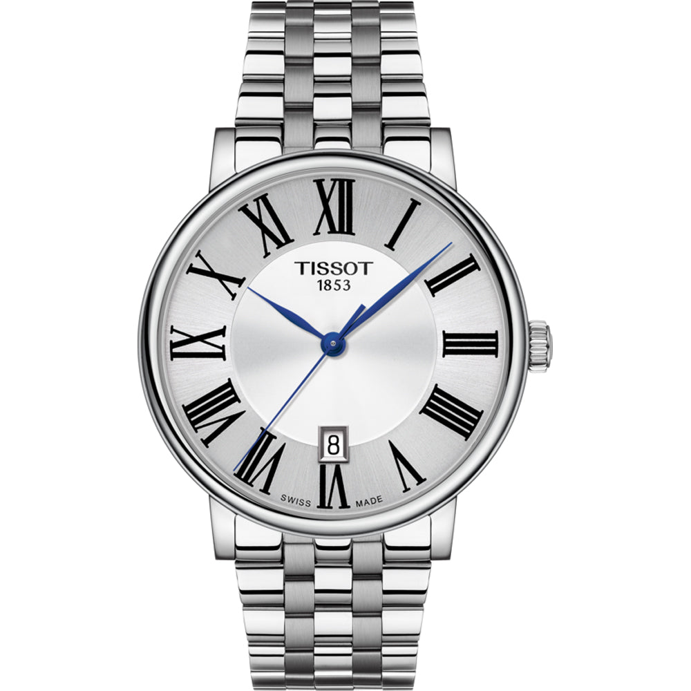 Reloj Tissot con esfera plateada, números romanos, manecillas azules y correa de acero inoxidable.