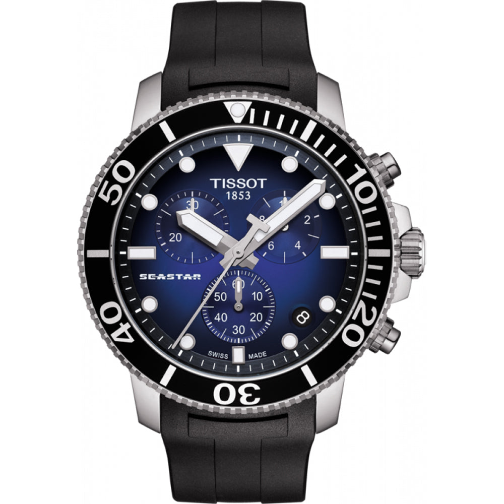 Reloj Tissot Seastar 1000 cronógrafo con esfera azul, bisel negro y correa de goma negra.
