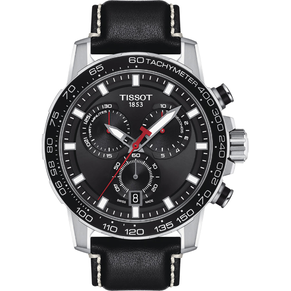 Reloj cronógrafo Tissot con esfera negra, correa de piel negra y detalles en rojo y plata.