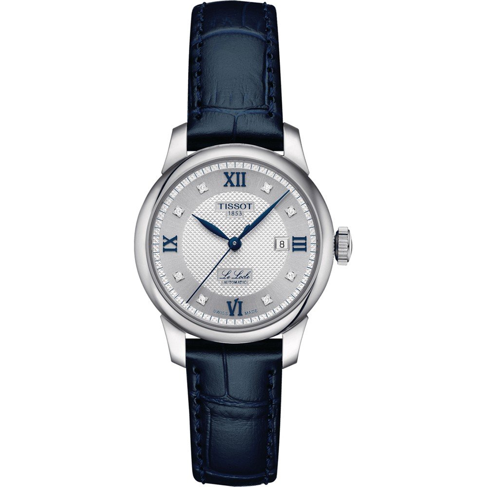 Reloj automático para dama Tissot Le Locle con esfera plateada, números romanos y correa de piel azul.