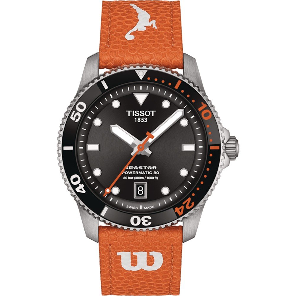 Reloj Tissot Seastar con esfera negra, correa de piel naranja y detalles en blanco.