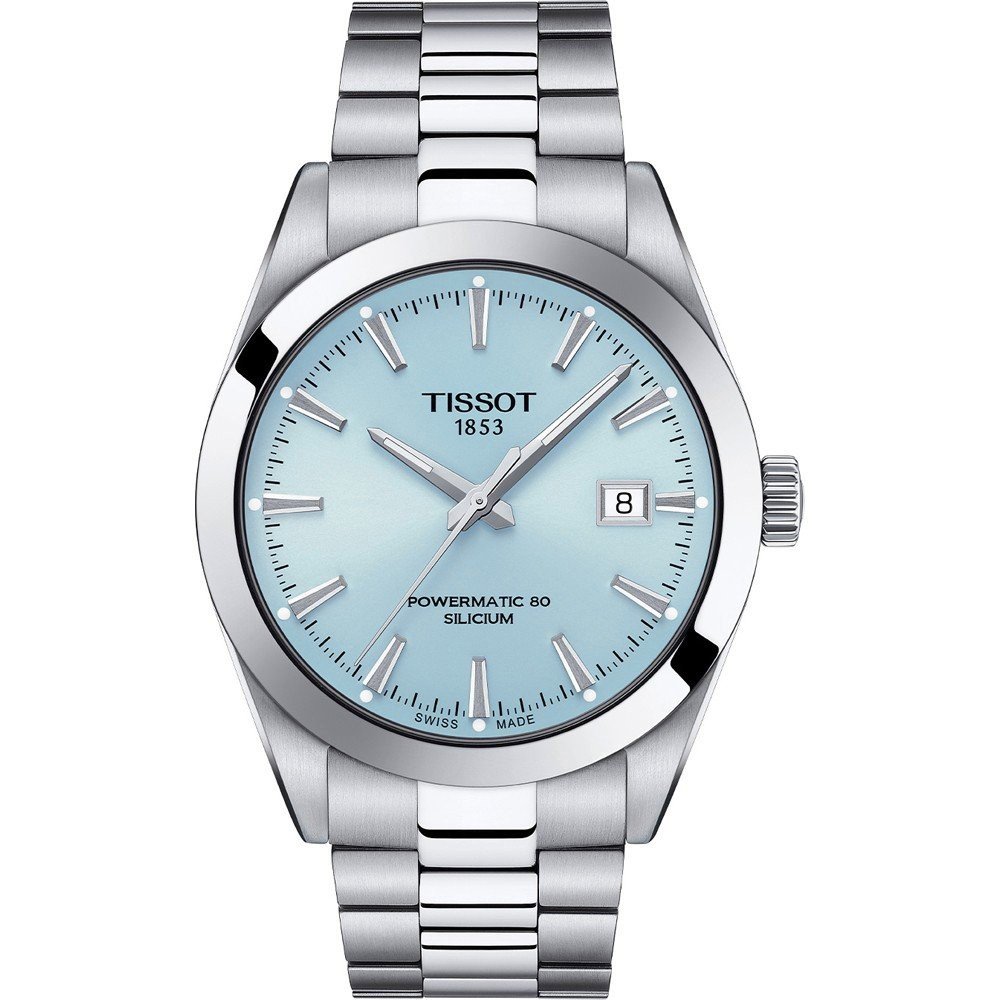 Reloj Tissot de acero inoxidable con esfera azul claro y correa de eslabones.
