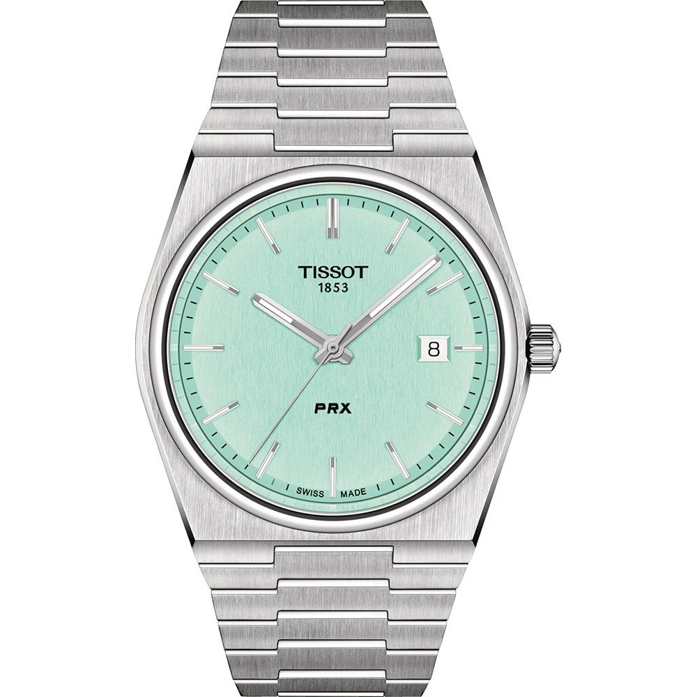 Reloj Tissot PRX con esfera verde menta, caja y correa de acero inoxidable, y fecha en la posición de las tres.