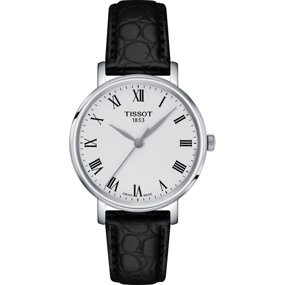 Reloj Tissot Everytime de 34 mm con esfera blanca, números romanos y correa de piel negra.