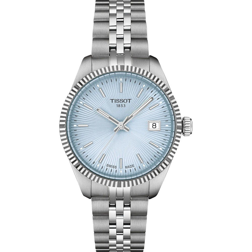 Reloj Tissot de 34 mm con esfera azul claro, caja de acero inoxidable y pulsera de malla.