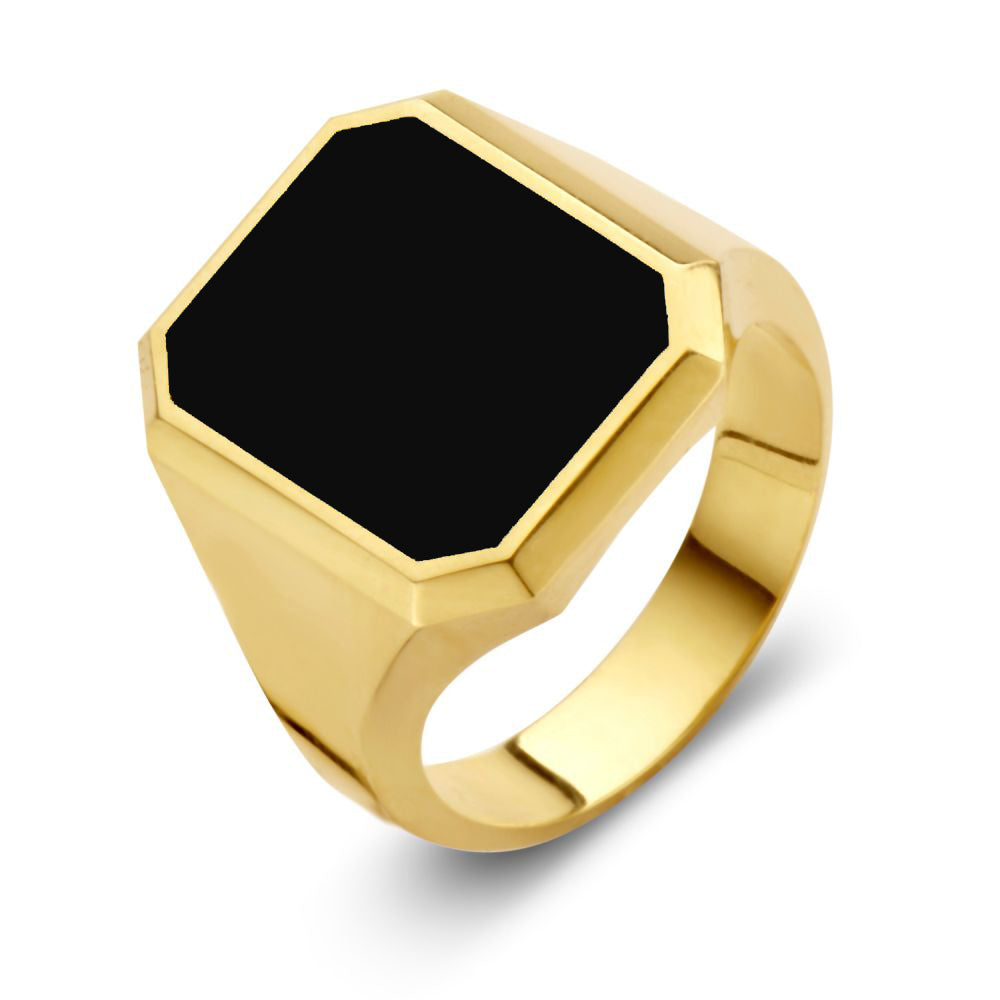 Anillo de sello masivo de 14 quilates en oro amarillo con piedra de ónix negra.