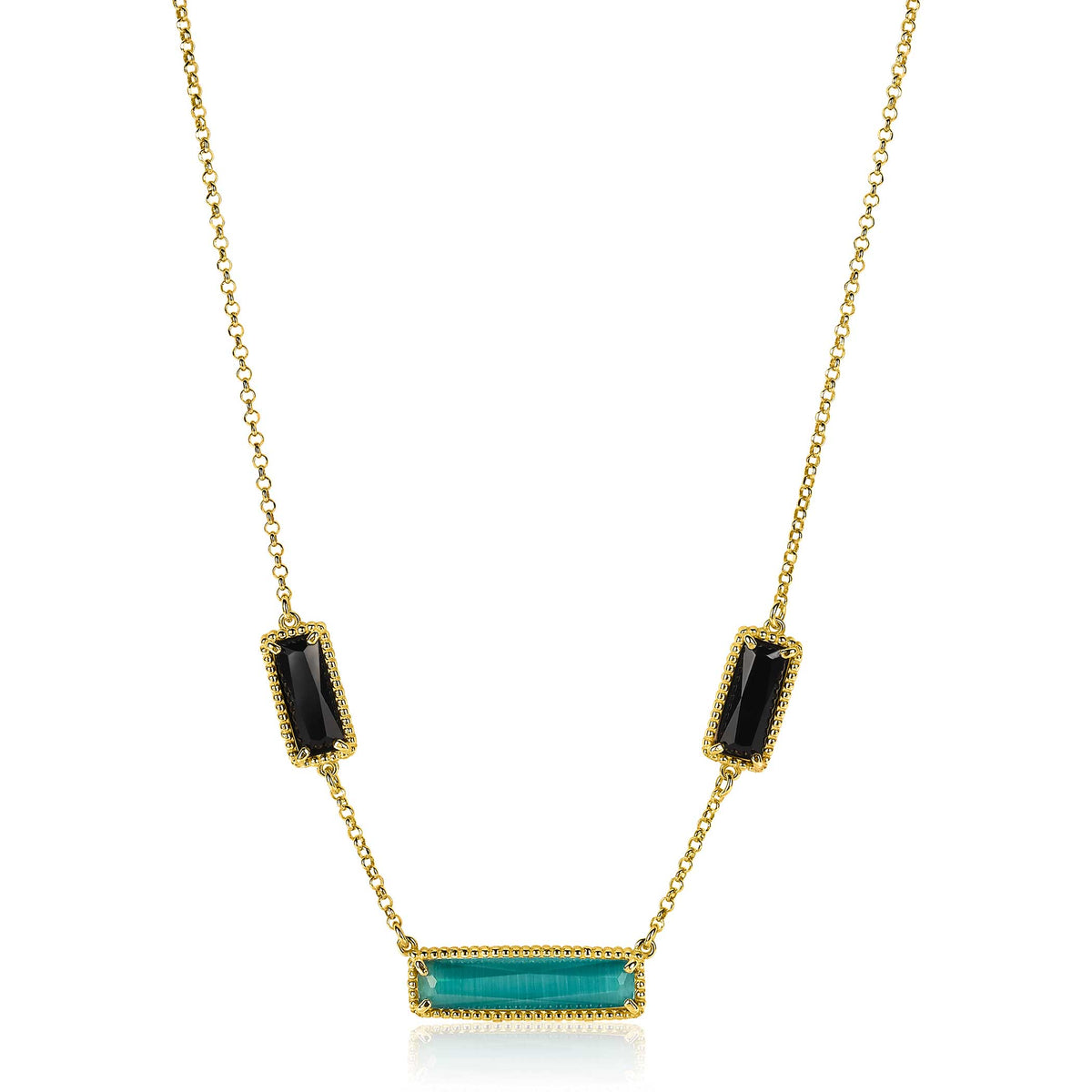 Collar dorado con tres piedras rectangulares, dos negras y una verde en el centro.