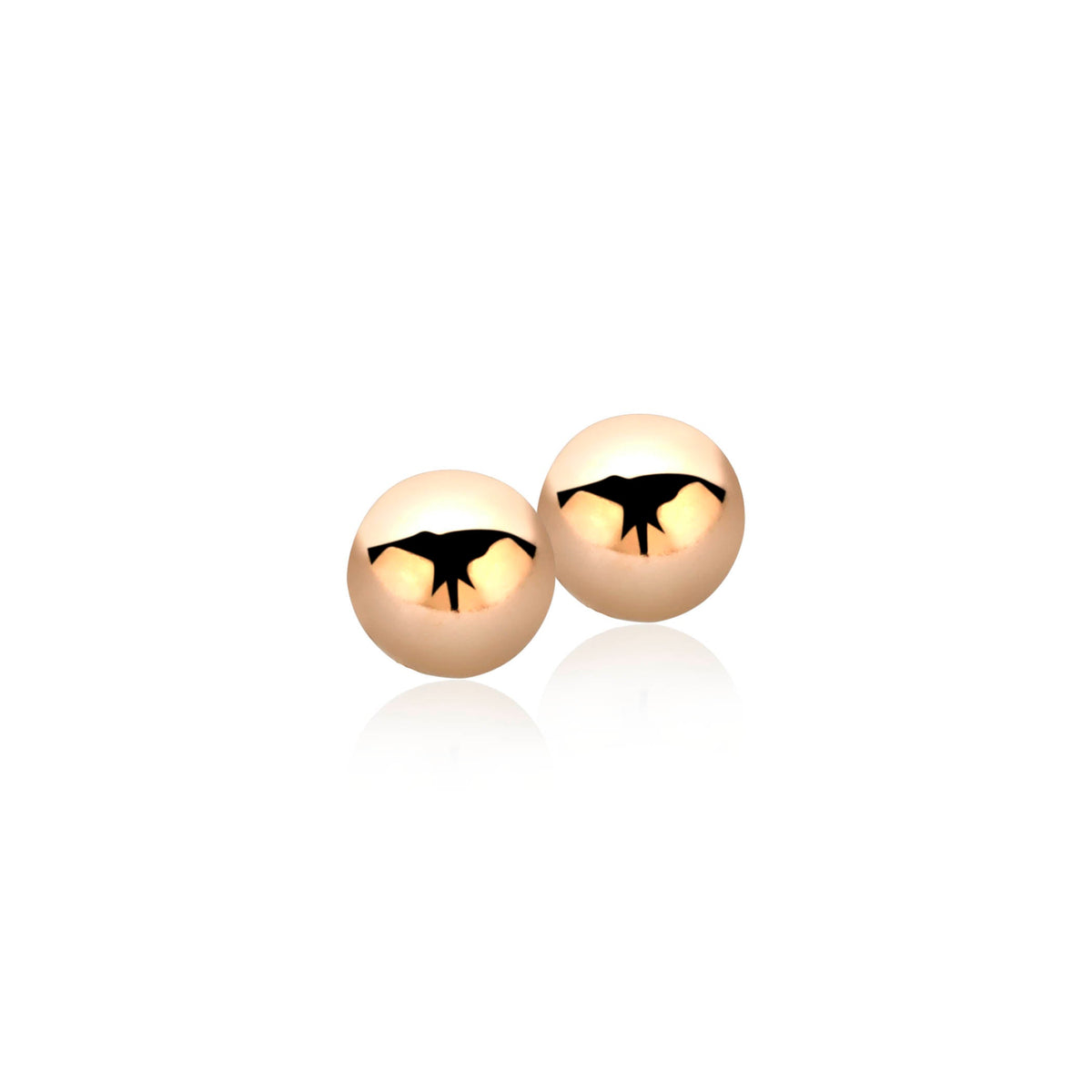 Pendientes de botón chapados en oro con diseño de ave en la parte frontal.