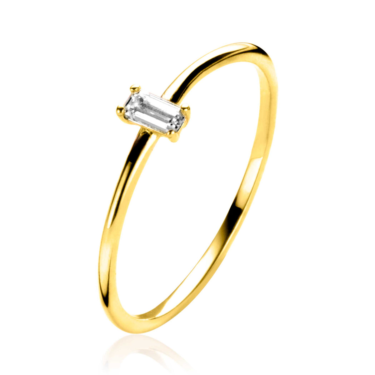 Anillo dorado con un cristal rectangular en el centro.