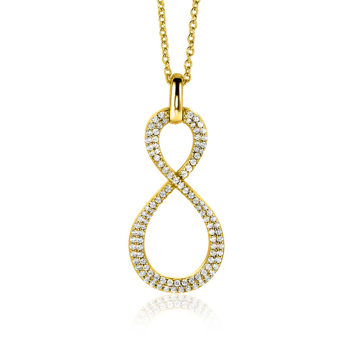 Colgante dorado en forma de infinito con cristales brillantes.