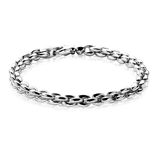 Pulsera de plata con eslabones entrelazados y acabado brillante.
