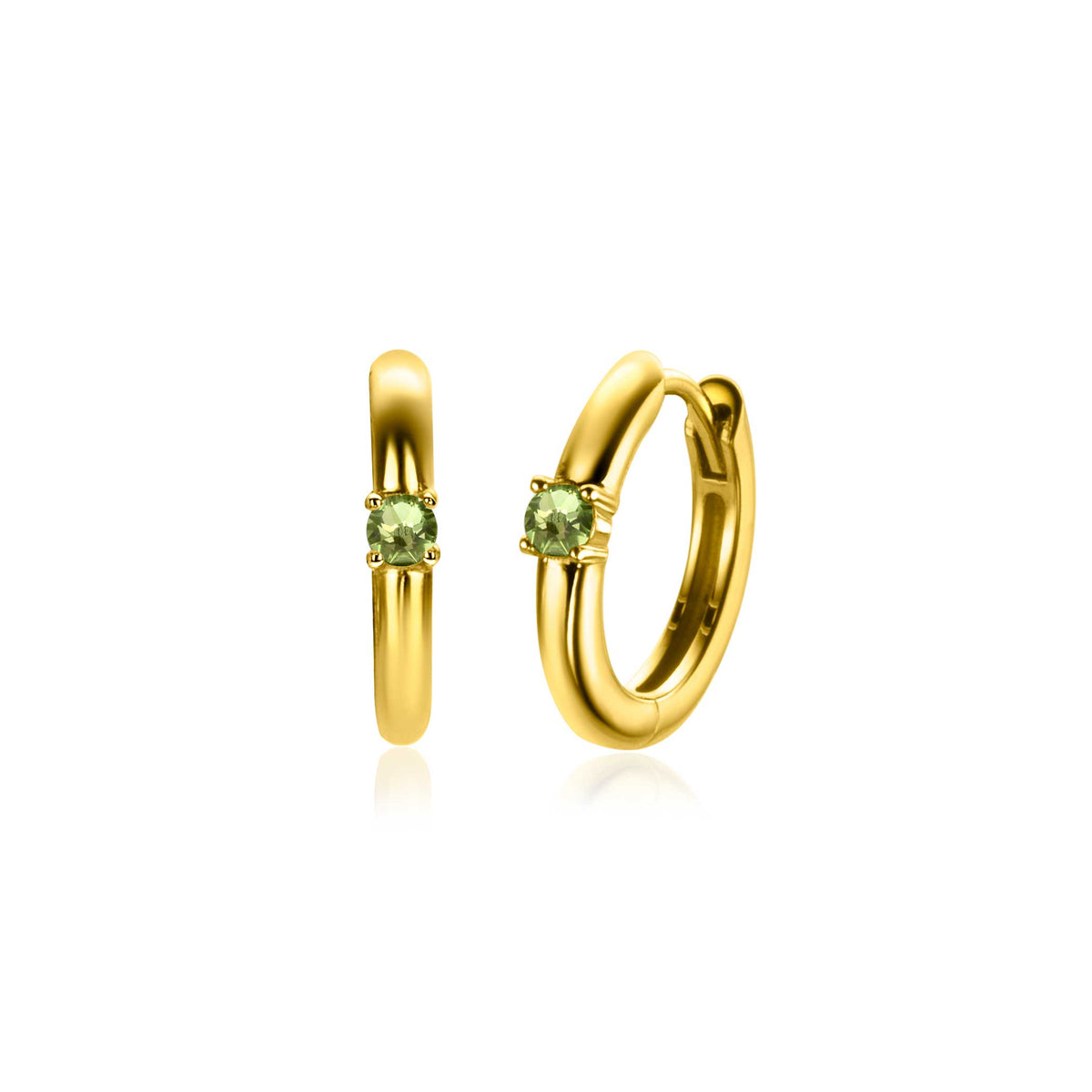 Pendientes de aro dorados con un pequeño cristal verde en el centro.