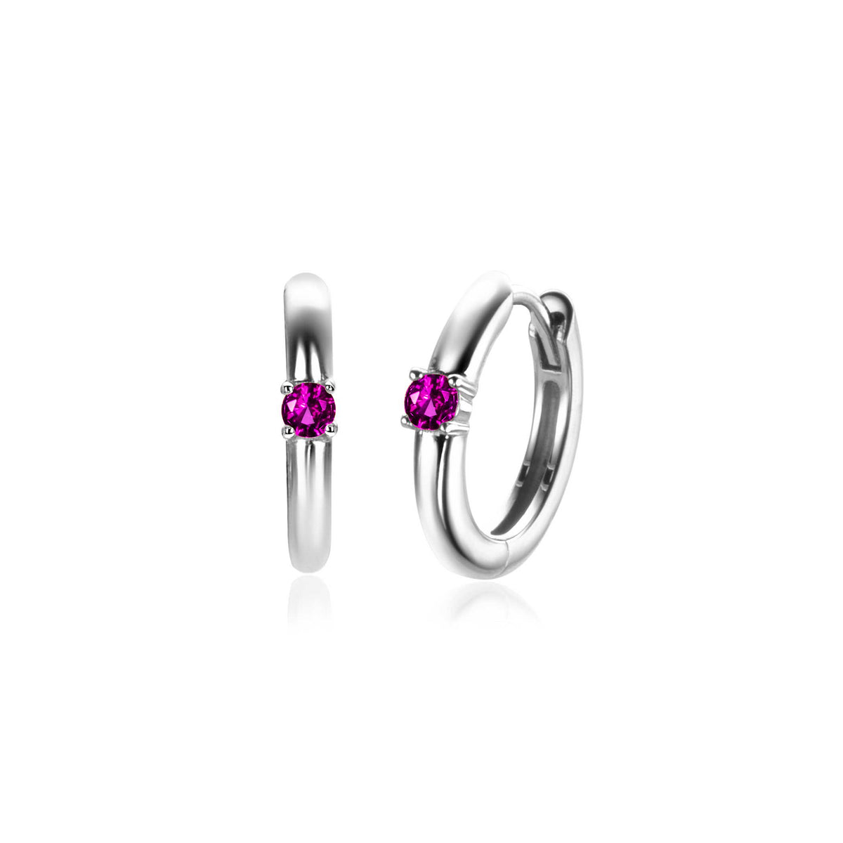 Pendientes de aro de plata con un brillante rosa en el centro.