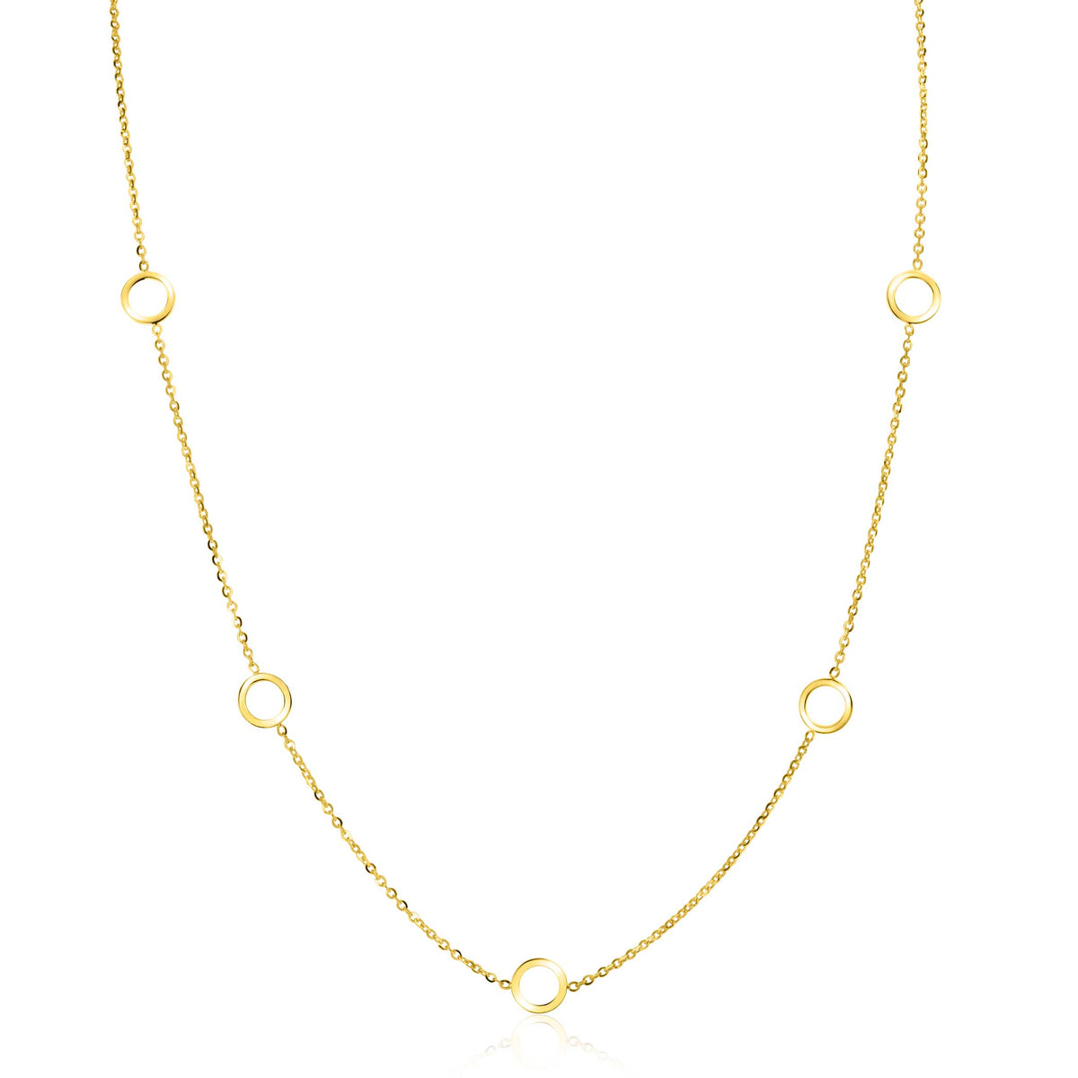 Collar dorado con eslabones circulares espaciados.