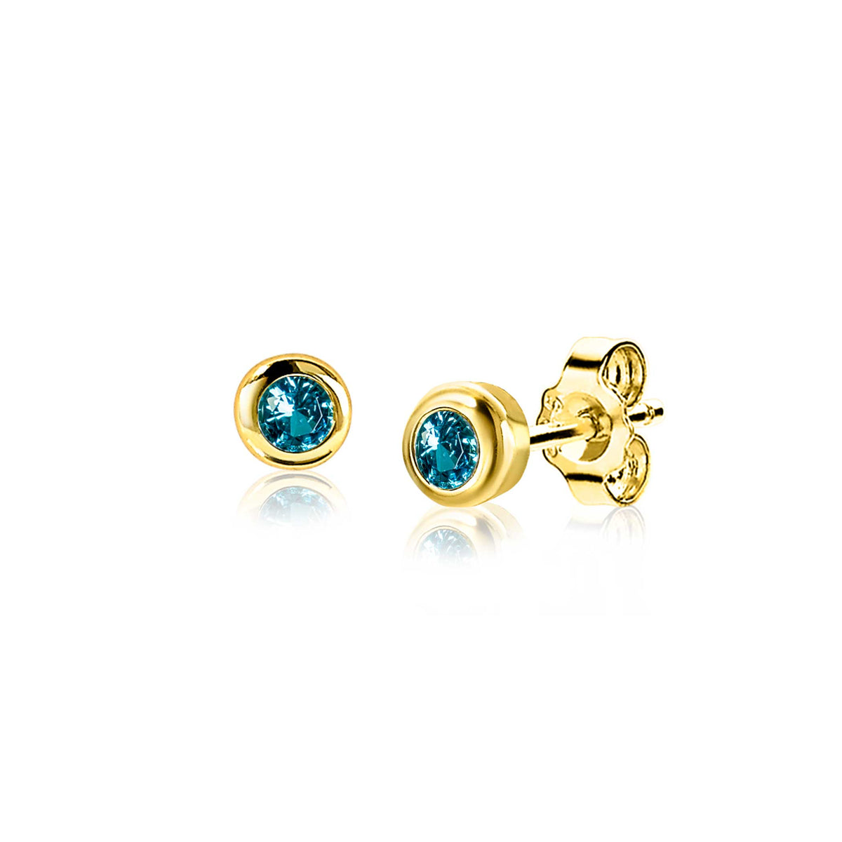 Pendientes de oro con piedra azul en el centro, de forma redonda y diseño sencillo.
