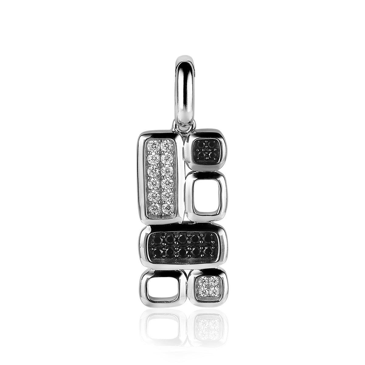 Colgante de plata con formas geométricas y detalles en circonitas negras y blancas.