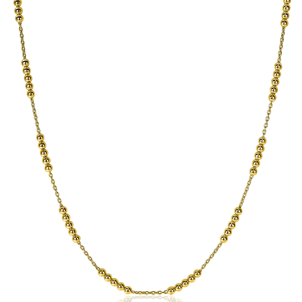 Cadena dorada con esferas brillantes y detalles en forma de bolitas.