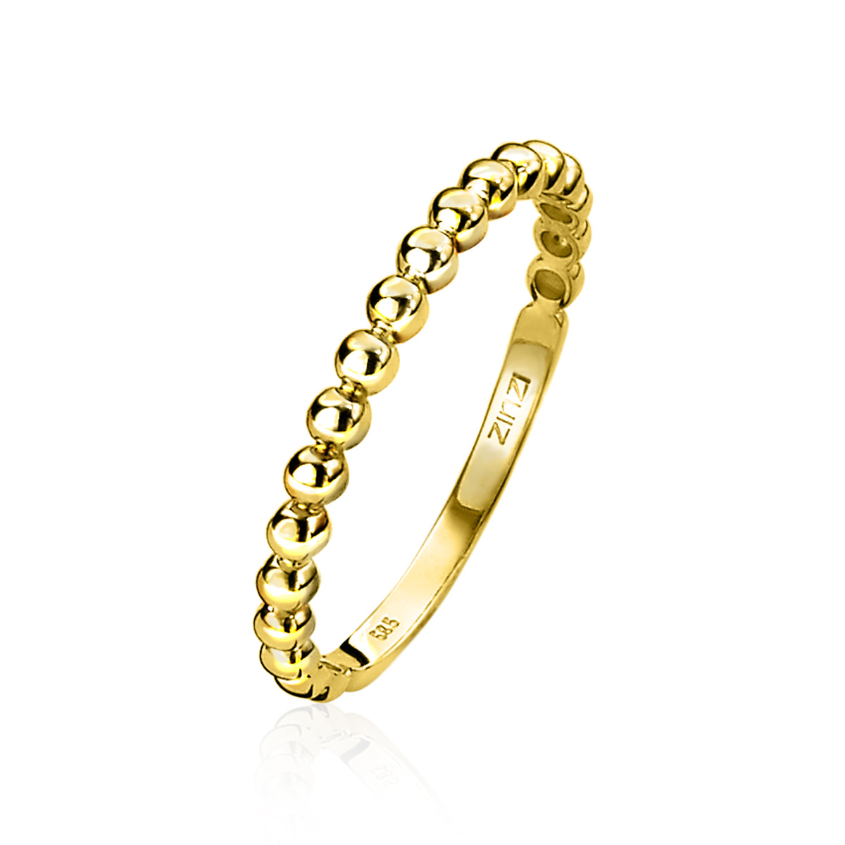 Anillo dorado con un diseño de esferas en toda su superficie.