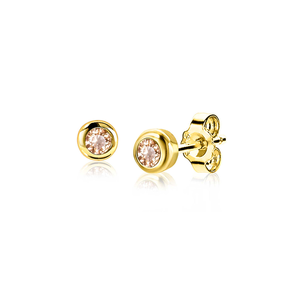 Pendientes de botón dorados con cristal rosa en el centro.