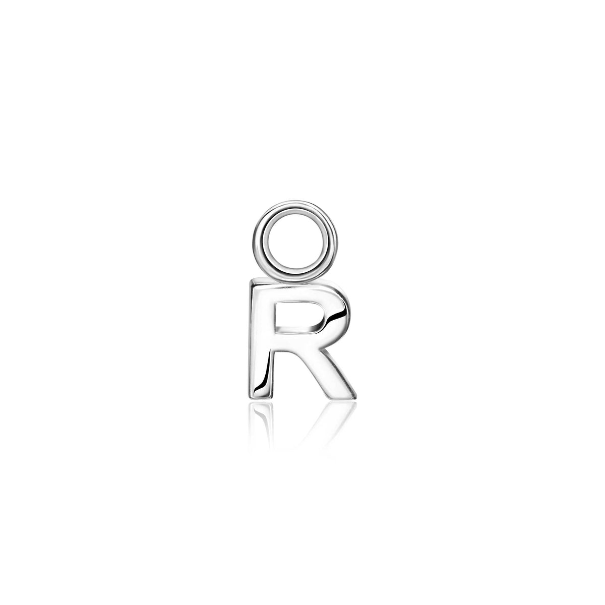 Pendiente de plata con forma de letra "R" y detalle circular en la parte superior.