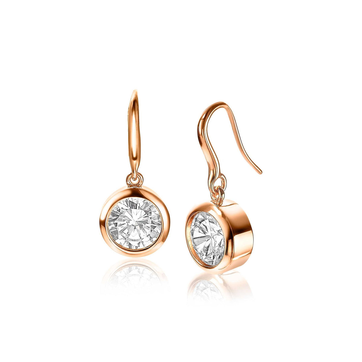 Pendientes de aro dorados con un brillante cristal transparente en el centro.