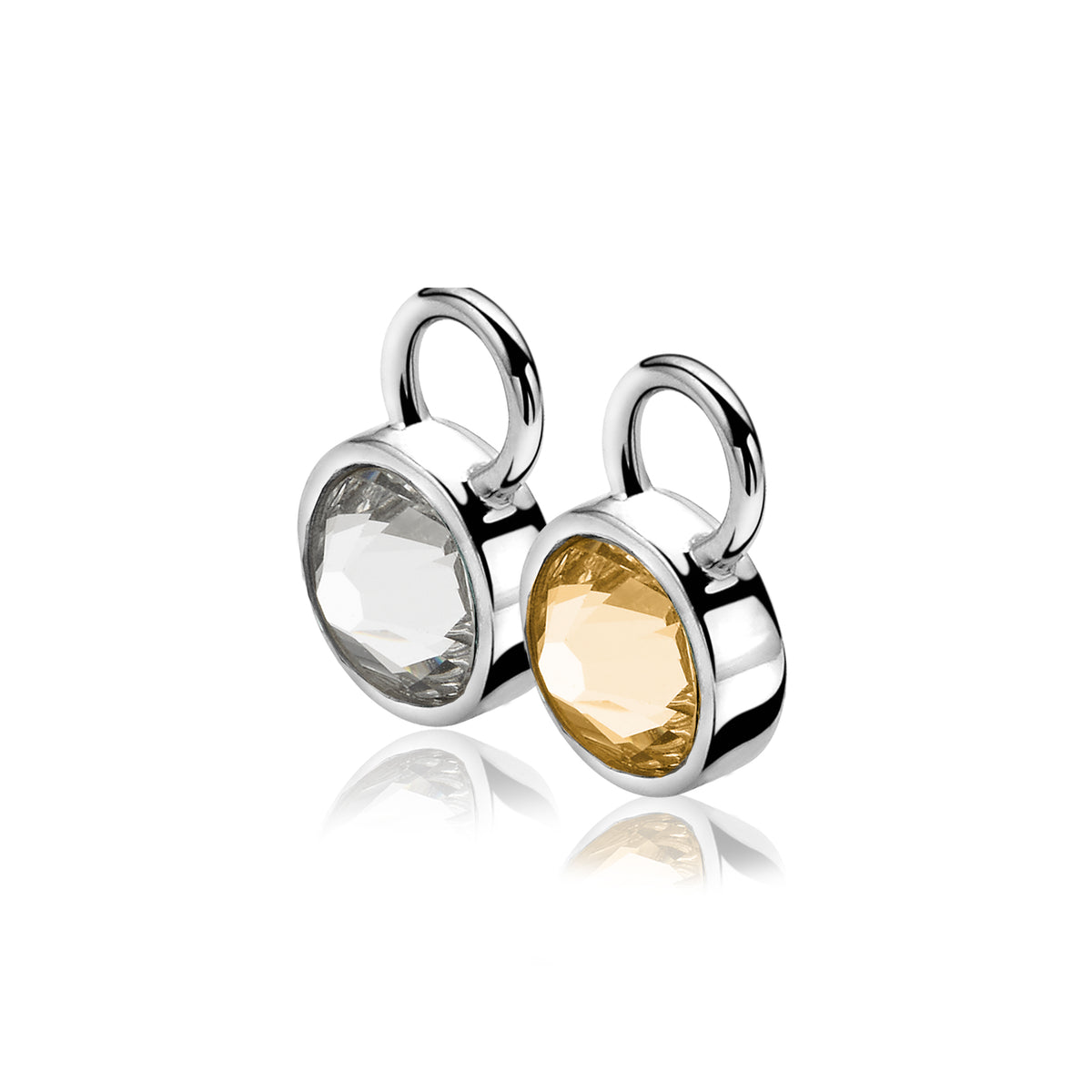 Pendientes de plata con piedras facetadas en tonos claro y dorado.