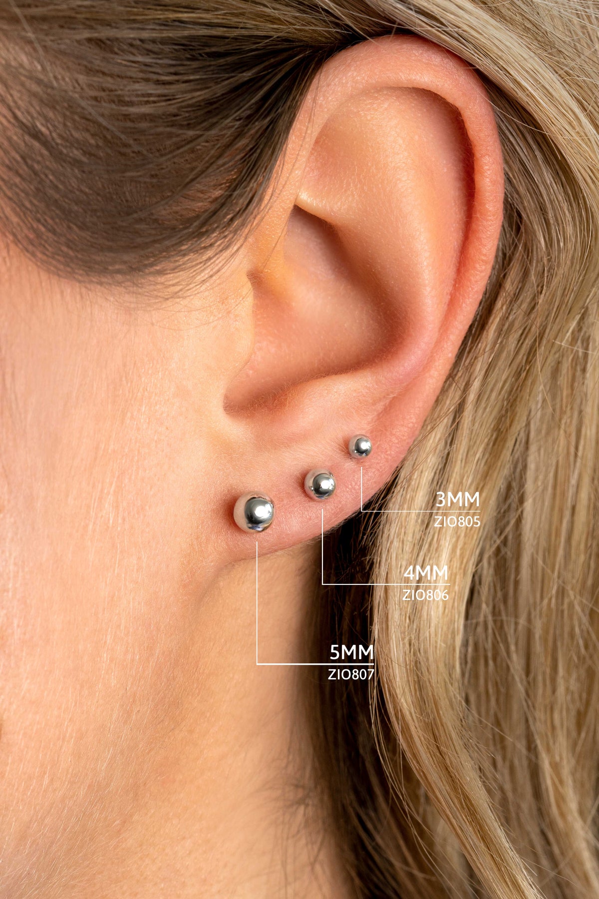 Pendientes de plata con esferas de diferentes tamaños, 3 mm, 4 mm y 5 mm.