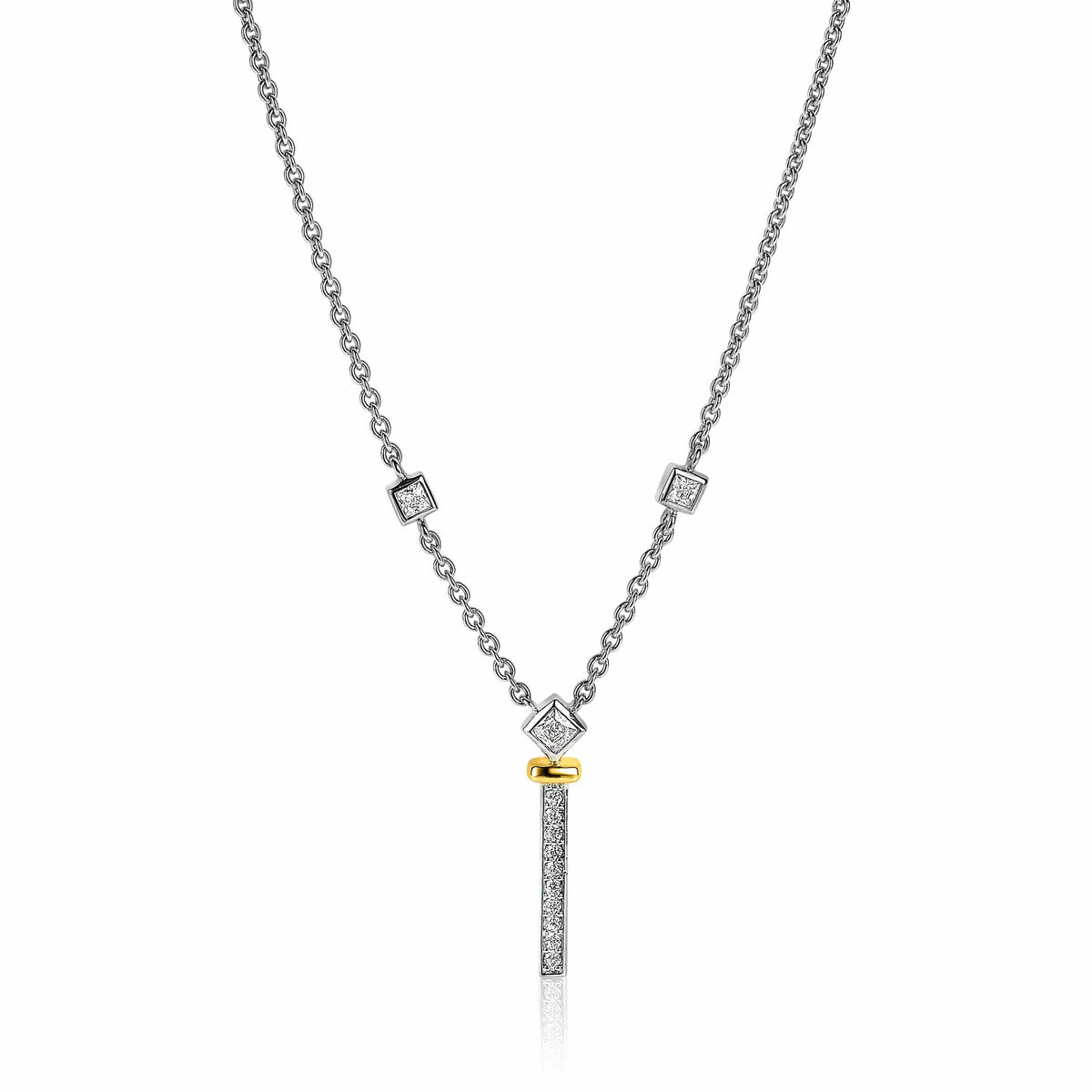 Collar de plata con detalles en forma de cubos y un colgante dorado con piedras brillantes.