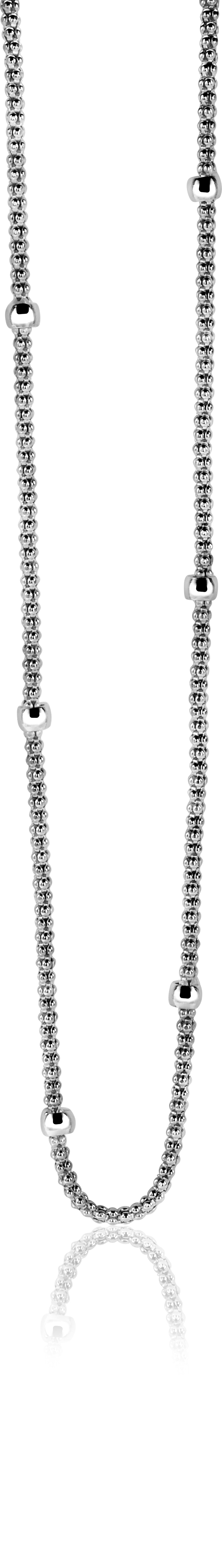 Cadena de plata con eslabones redondos y detalles esféricos.