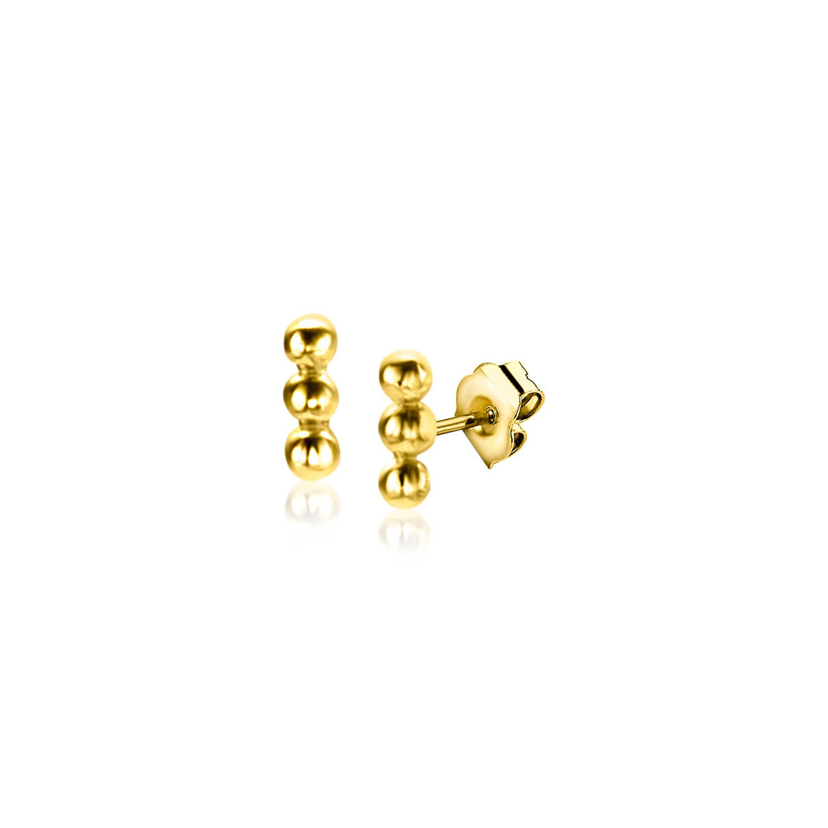 Pendientes de oro con tres esferas brillantes en línea vertical.