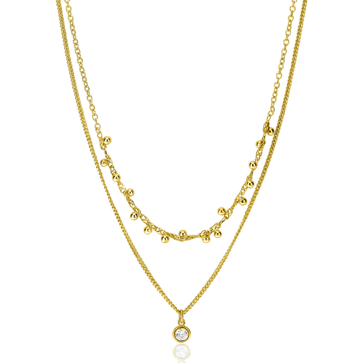 Collar dorado con dos cadenas, una con charms y otra con un colgante brillante.