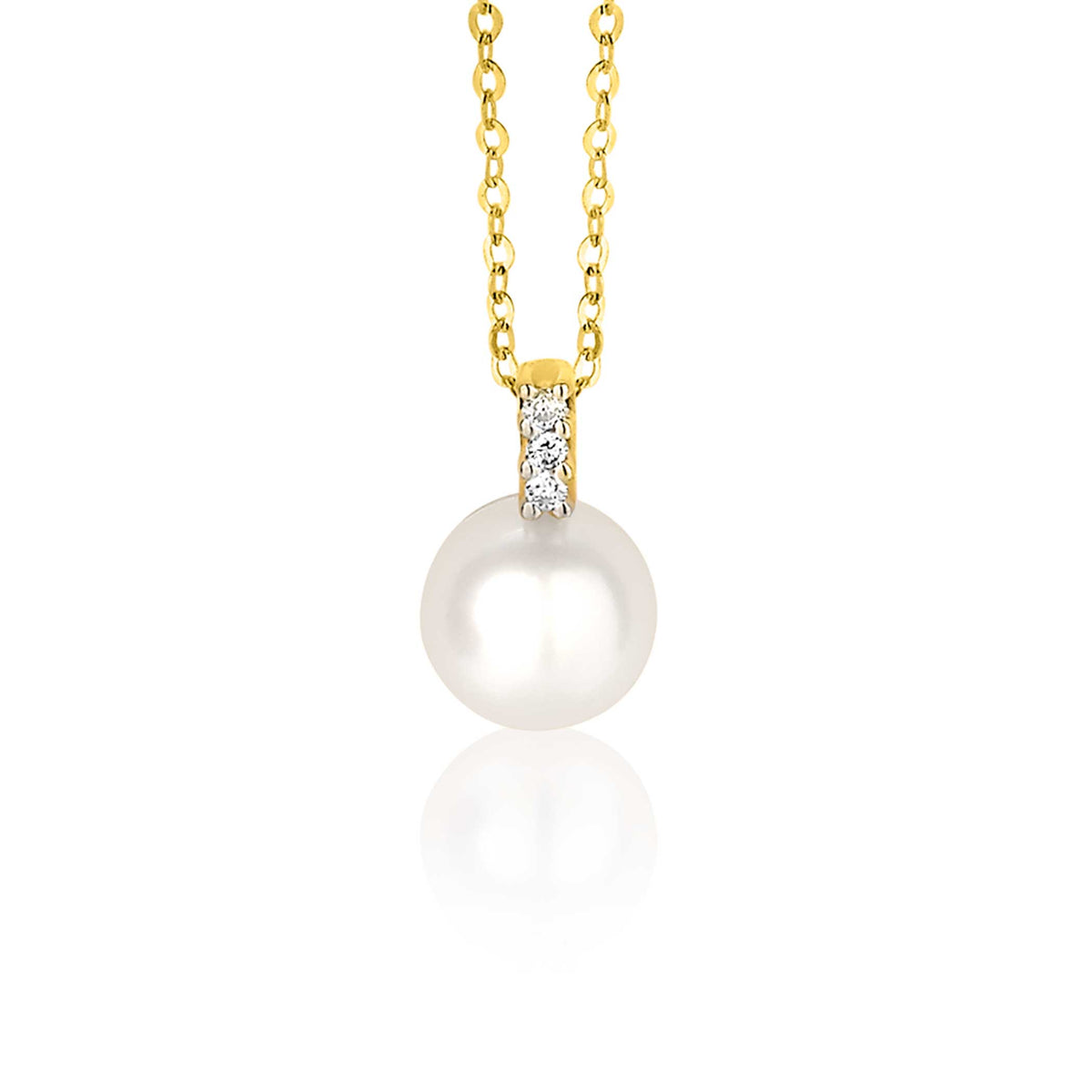 Colgante dorado con perla blanca y detalles en circonitas.
