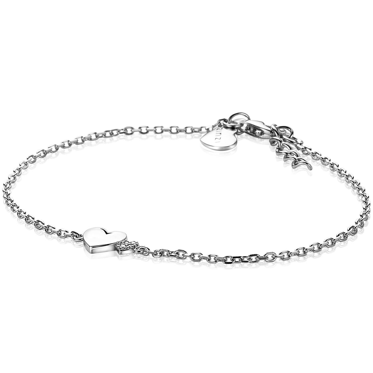 Pulsera de plata con eslabones y colgante en forma de corazón.