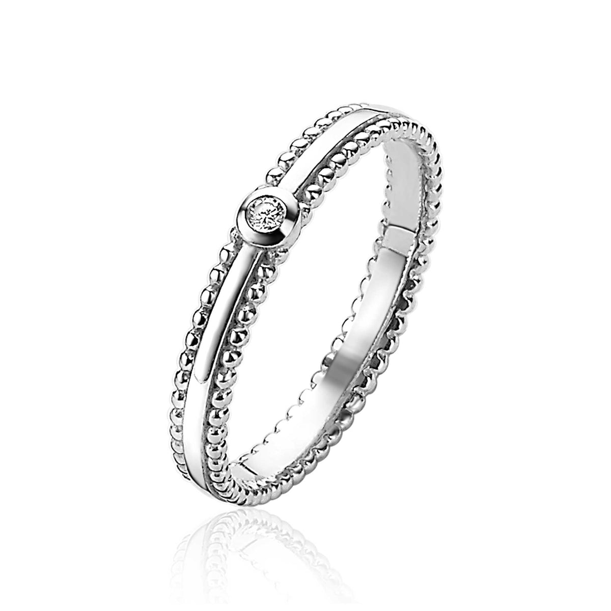 Anillo de plata con detalle de bolitas y una piedra brillante en el centro.