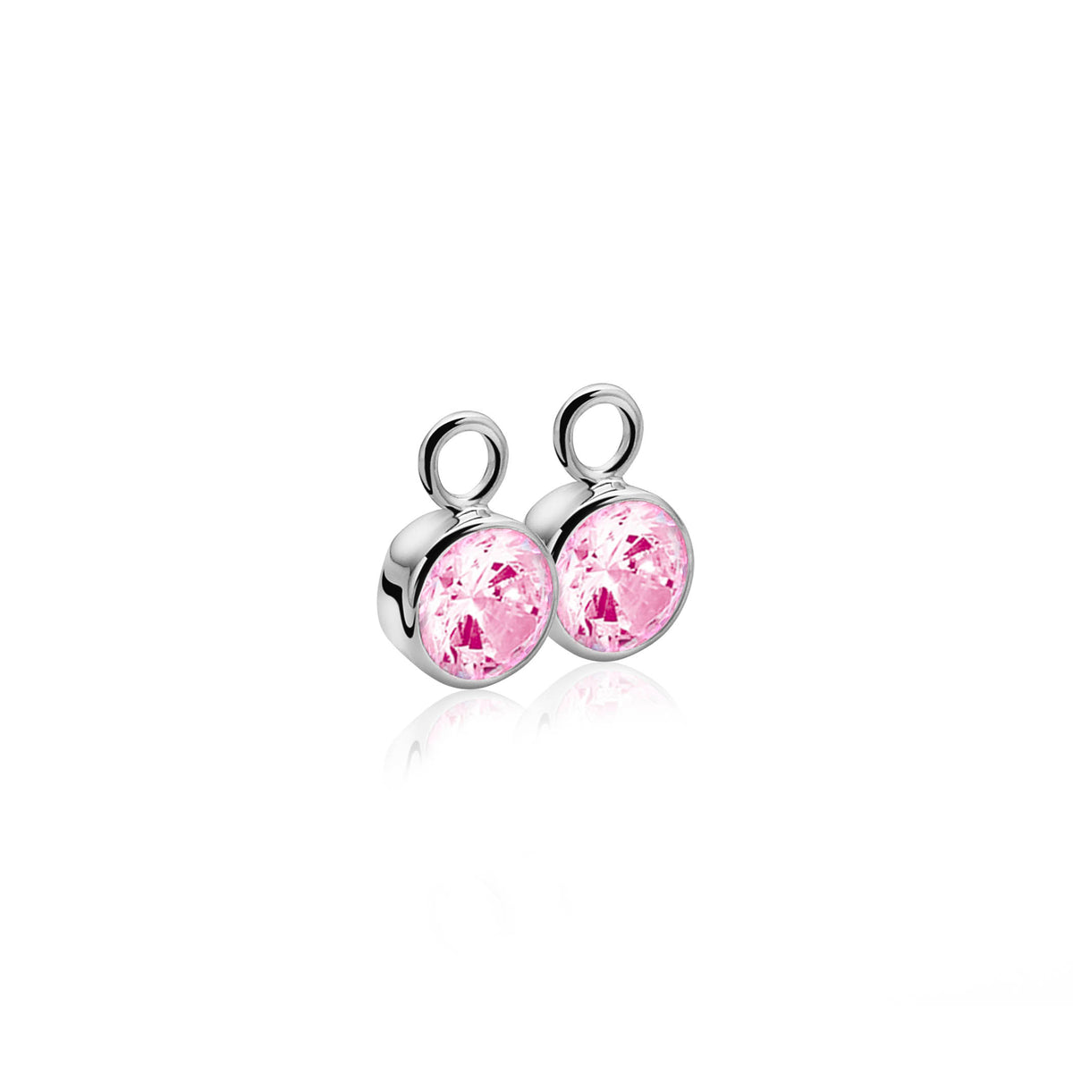 Pendientes de plata con piedras rosas brillantes en forma redonda.