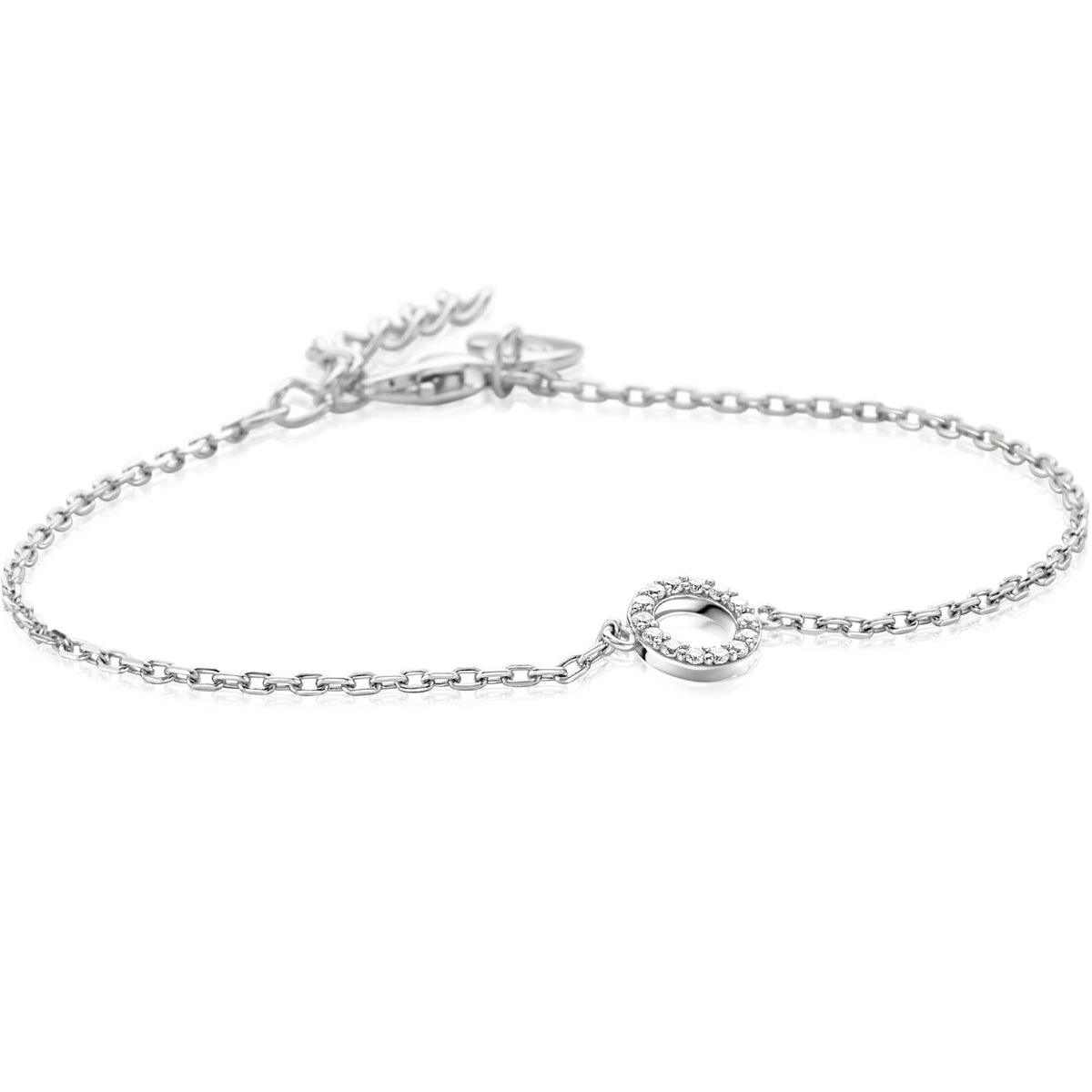 Pulsera de plata con un colgante circular decorado y cadena delicada.