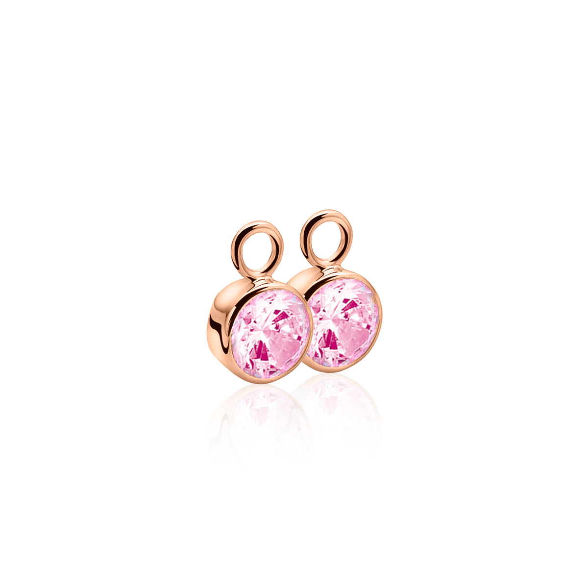 Pendientes de aro dorados con piedras rosas brillantes.